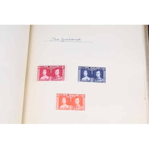 523 - A stamp album containing stamps marking the silver jubilee of King George V from the UK and Commonwe... 