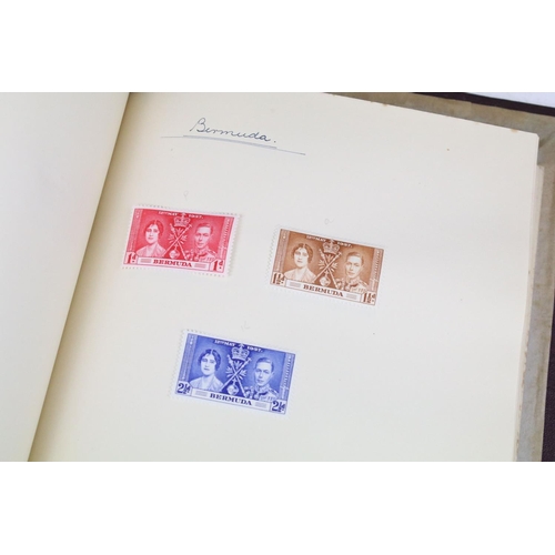 523 - A stamp album containing stamps marking the silver jubilee of King George V from the UK and Commonwe... 