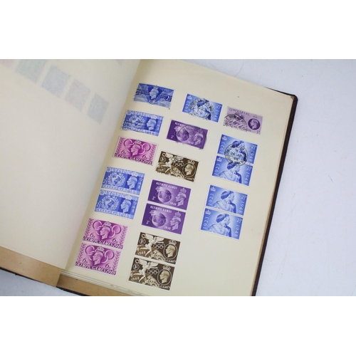 524 - A stamp album containing UK and world stamps to include King Edward VIII together with a UK album in... 