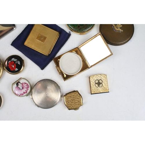 382 - A collection of mainly vintage powder compacts to include silver and Stratton examples.