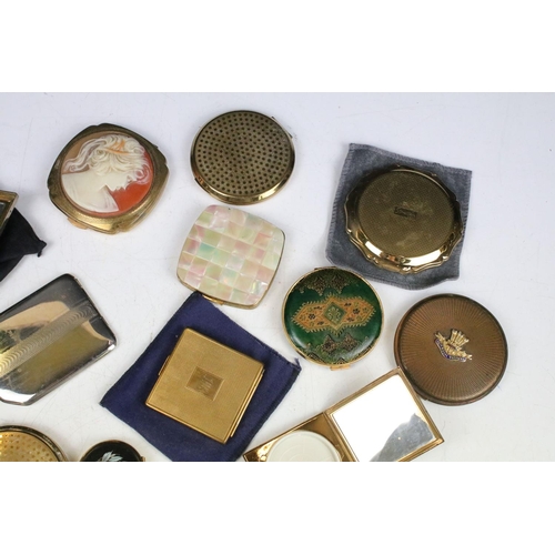 382 - A collection of mainly vintage powder compacts to include silver and Stratton examples.