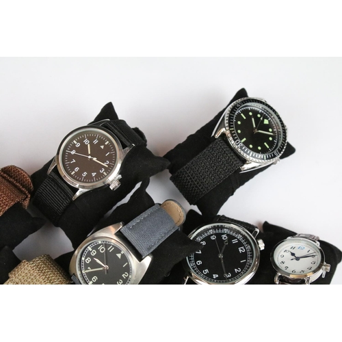 390 - A collection of contemporary military style quartz wristwatches