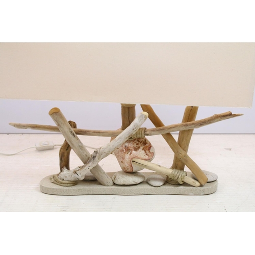 392 - Beach themed table lamp made with driftwood and stones, with rectangular shade, approx 47cm high