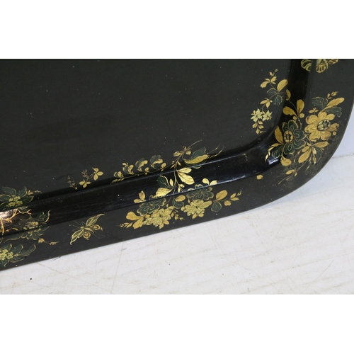 398 - Large 19th century black lacquered papier mache tray of rectangular form with gilt decoration, appro... 