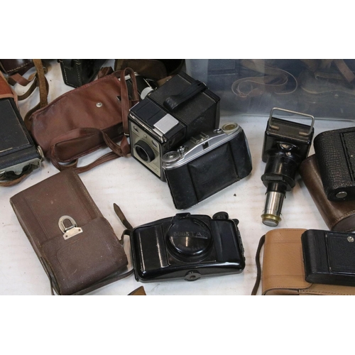 406 - Photographic Equipment - A collection of cameras & accessories to include Agfa, Folding Brownie Six-... 