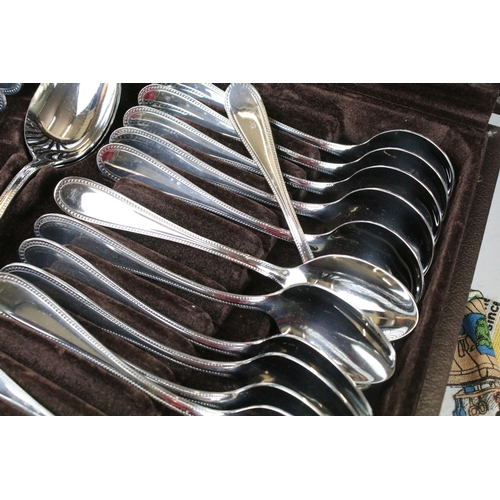 411 - Ashberry & Degrenne Ltd six setting canteen of stainless steel cutlery