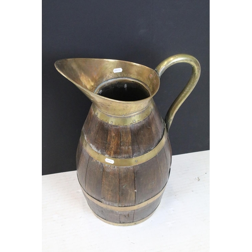 455 - Large Victorian coopered oak cider jug with brass handle, approx 59cm tall