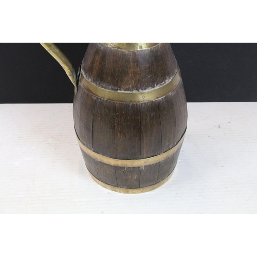 455 - Large Victorian coopered oak cider jug with brass handle, approx 59cm tall