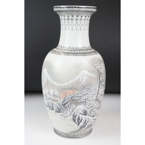 11 - Large Chinese porcelain baluster vase decorated in enamels with a winter landscape within black jewe... 