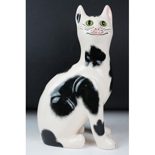 17 - Griselda Hill Pottery Wemyss black and white cat, signed G. Hill Pottery to base and Wemyss, 34cm hi... 