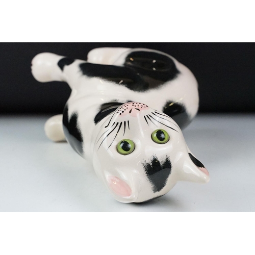 17 - Griselda Hill Pottery Wemyss black and white cat, signed G. Hill Pottery to base and Wemyss, 34cm hi... 