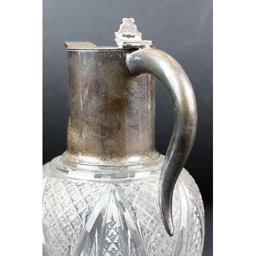 22 - Cut glass claret jug, with silver mounts, hallmarked London, 1903, 22cm high, a cut glass decanter w... 