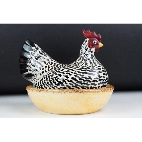 23 - Emma Bridgewater egg holder in the form of a chicken sitting on a nest, 24cm long together with a Po... 