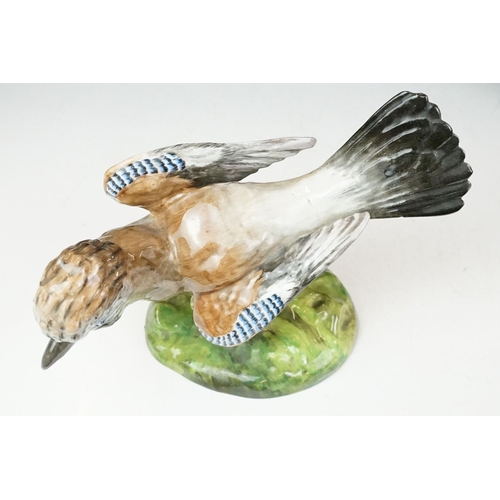 31 - Crown Staffordshire, J T Jones model of a jay, 16.5cm high together with a pair of Staffordshire fla... 