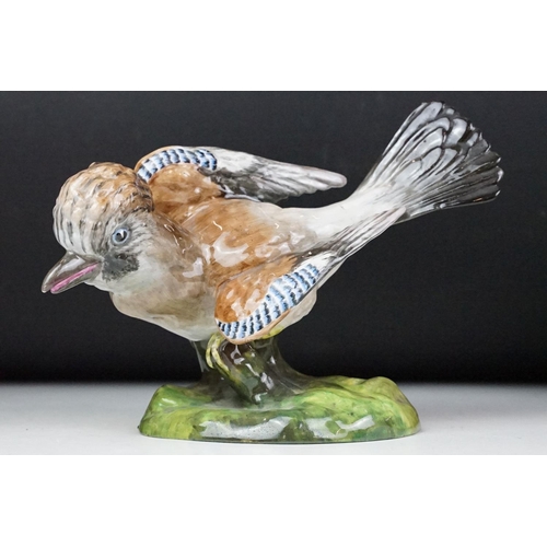 31 - Crown Staffordshire, J T Jones model of a jay, 16.5cm high together with a pair of Staffordshire fla... 