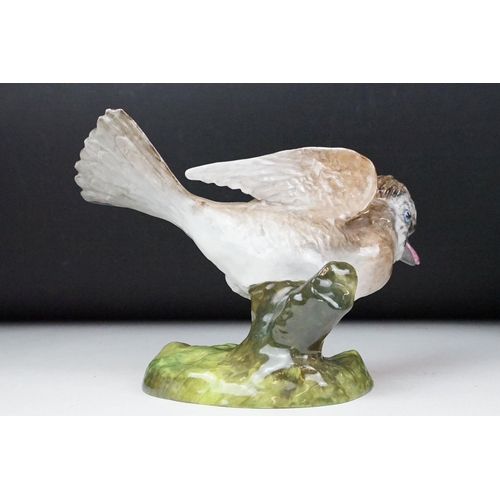 31 - Crown Staffordshire, J T Jones model of a jay, 16.5cm high together with a pair of Staffordshire fla... 