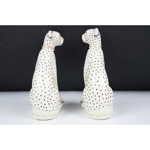 4 - Miranda C Smith, pair of hand painted cheetahs in the manner of Staffordshire Pottery, each signed b... 