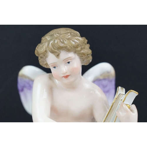 5 - Meissen figure of an angel playing a lyre and a mermaid, blue crossed swords mark to base, incised n... 