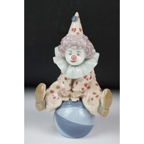 9 - Lladro Tired Friend, model 5812, 13cm high, Lladro Having a Ball, model 5813, 18cm high, Beswick fig... 