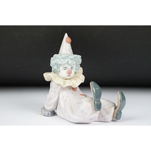 9 - Lladro Tired Friend, model 5812, 13cm high, Lladro Having a Ball, model 5813, 18cm high, Beswick fig... 