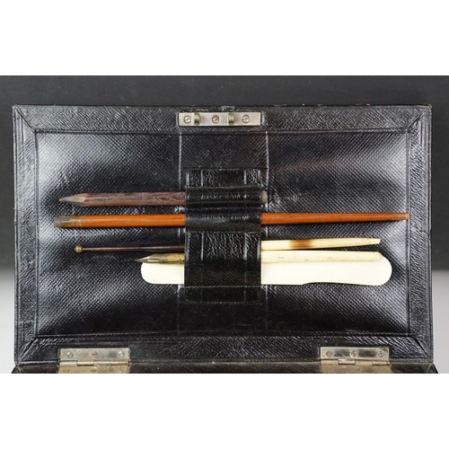 122 - Late 19th / early 20th century leather clad stationery box, the contents to include dip pen, inkwell... 