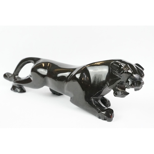 185 - Two chrome jaguar car mascots, together with two miniature chrome jaguars and a black resin jaguar (... 