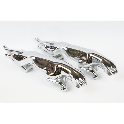 185 - Two chrome jaguar car mascots, together with two miniature chrome jaguars and a black resin jaguar (... 