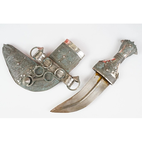 186 - A late 19th / early 20th century Yemin silver mounted over leather sheath Jambiya.