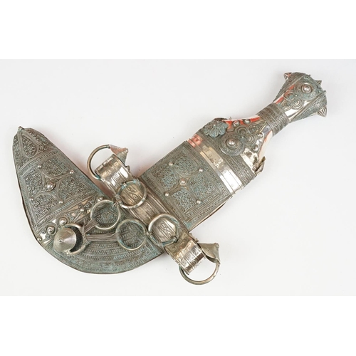 186 - A late 19th / early 20th century Yemin silver mounted over leather sheath Jambiya.