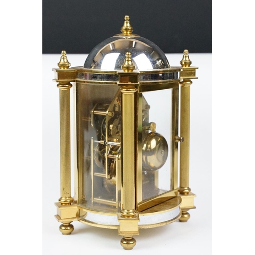 188 - 20th century Woodford brass chiming mantel clock of architectural form, with gilt chapter ring and b... 