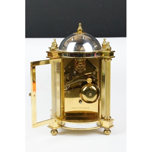 188 - 20th century Woodford brass chiming mantel clock of architectural form, with gilt chapter ring and b... 