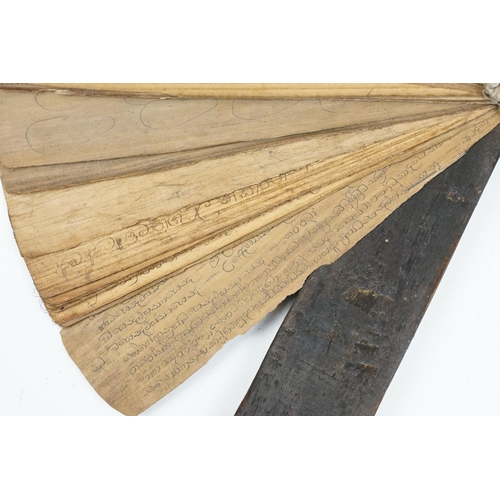 193 - An antique Sri Lanka palm leaf manuscript comprising Buddhist mantras.