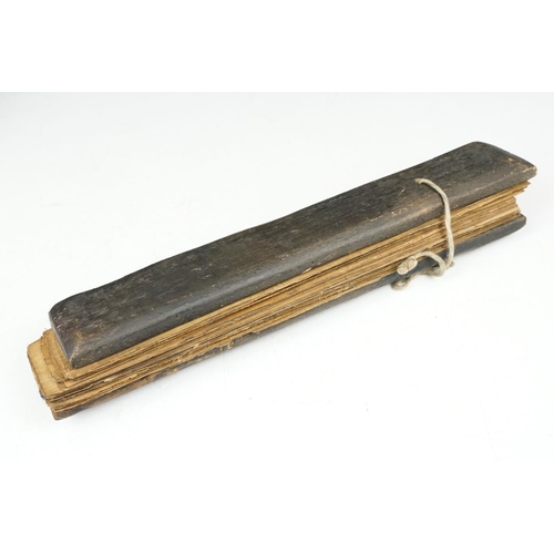 193 - An antique Sri Lanka palm leaf manuscript comprising Buddhist mantras.