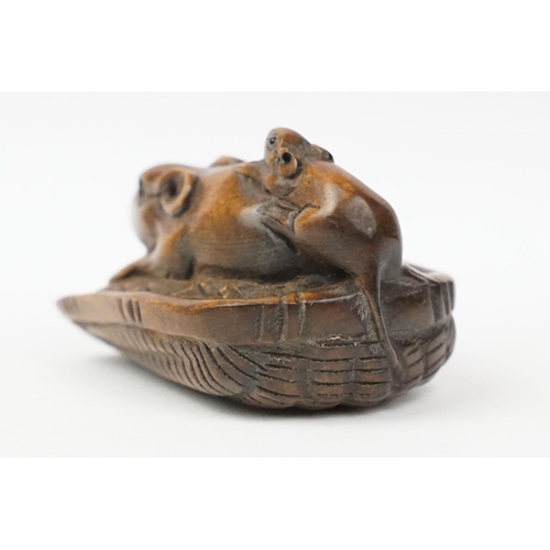 200 - Netsuke with rat and babbies, signed