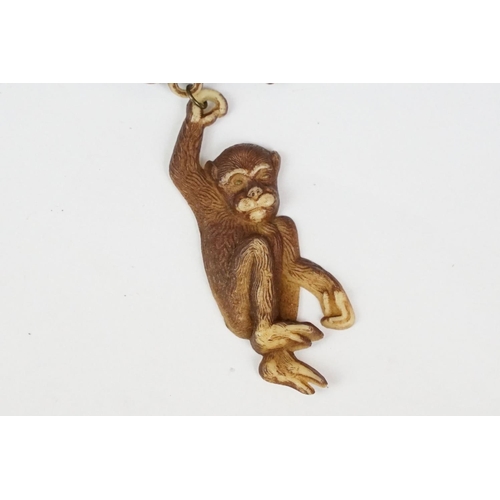 207 - A 1920's / 1930's Charles Horner swinging Monkey brooch.