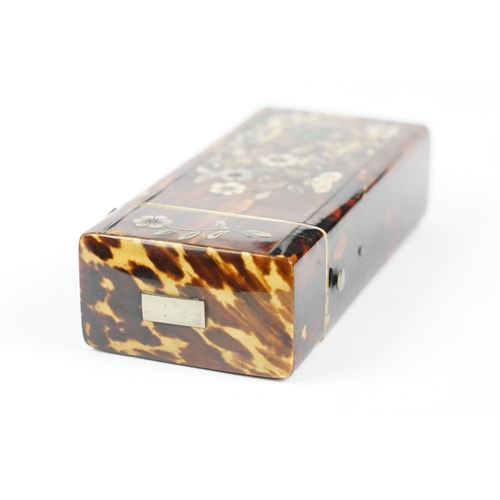 210 - An early 20th century tortoiseshell spectacle case with mother of pearl floral decoration. (CITES re... 