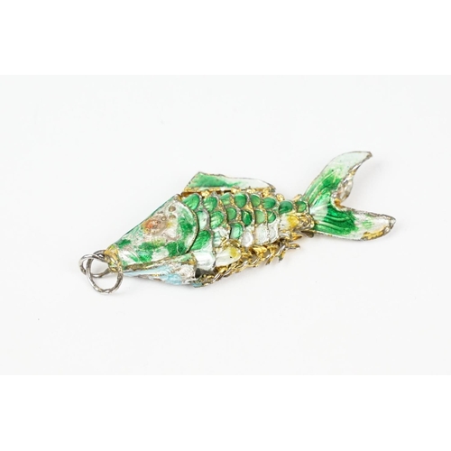 227 - Carved Horn Snuff Box in the form of a Fish, 5cm together with an Enamelled Articulated Fish