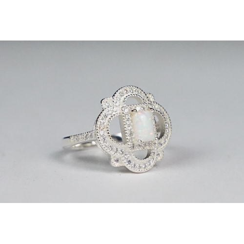 244 - Silver CZ and opal panelled ring in the art nouveau style