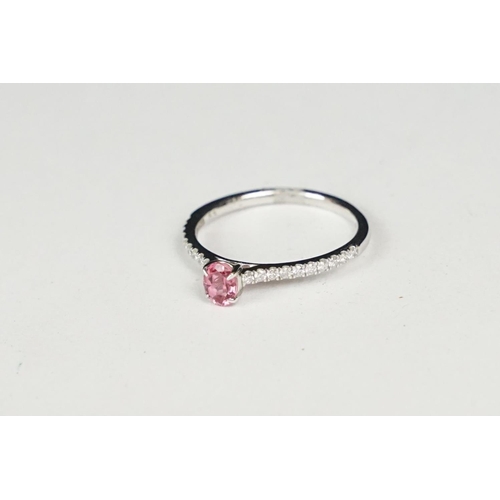 246 - Platinum set pink sapphire and diamond ring