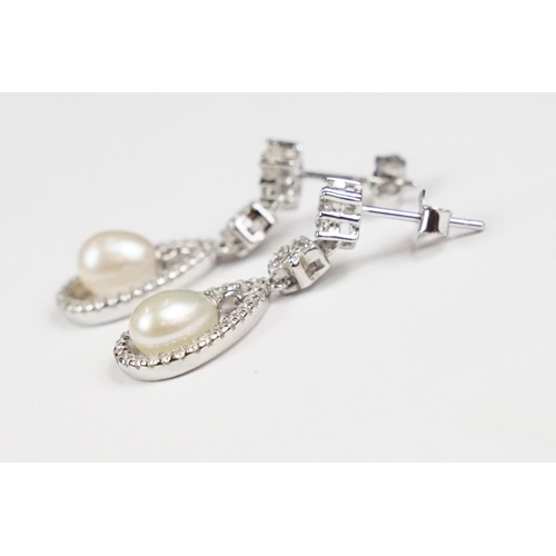 261 - Pair of silver and pearl drop earrings