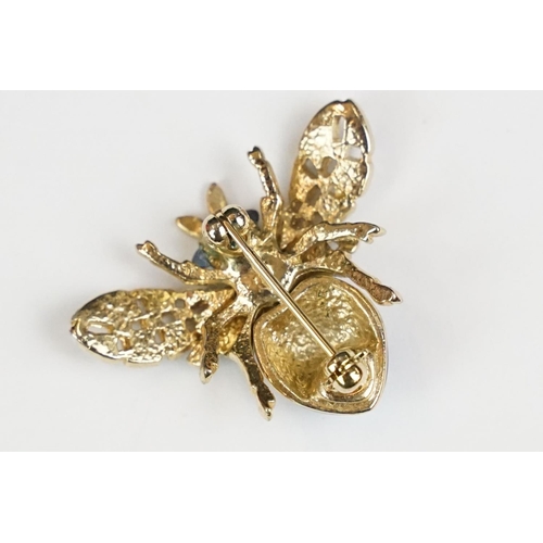 266 - Gilt bee brooch with diamonte and glass body and eyes