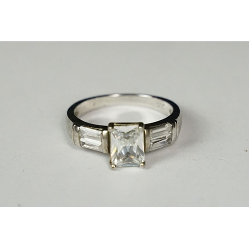 268 - Silver and emerald cut CZ dress ring