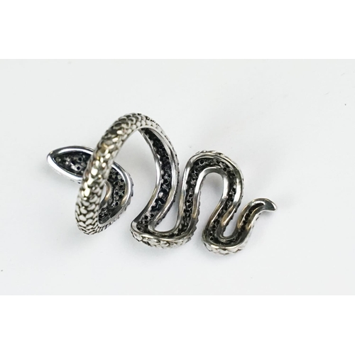 276 - A ladies silver dress ring in the the form of a snake, marked 925 to the inner shank.