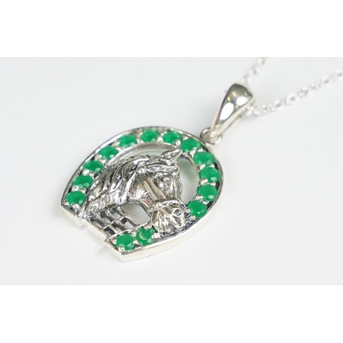 278 - Silver and emerald horse shoe pendant necklace