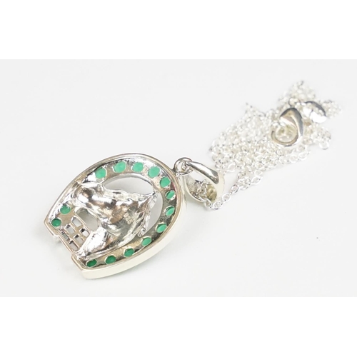 278 - Silver and emerald horse shoe pendant necklace