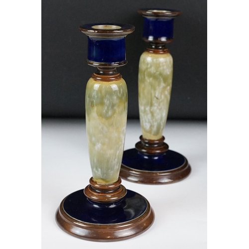 43 - Pair of Doulton Lambeth Stoneware candlesticks, no. 821, initialled PB, height approx 20.5cm