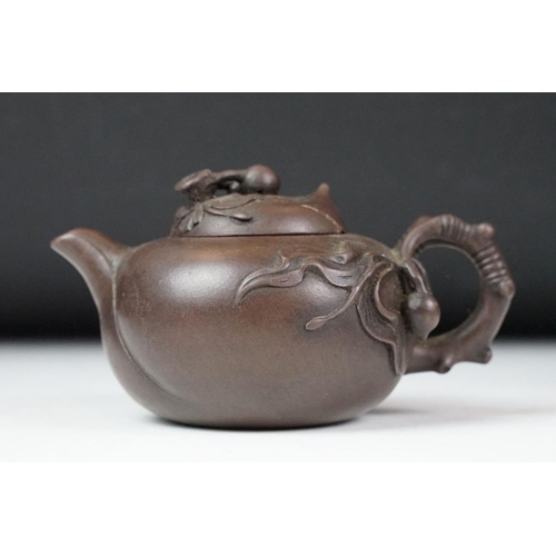 47 - Chinese terracotta Yixing tea ware to include a teapot with four small matching tea cups, teapot wit... 