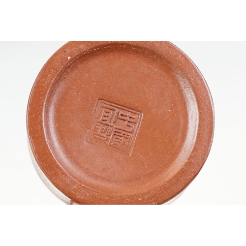 47 - Chinese terracotta Yixing tea ware to include a teapot with four small matching tea cups, teapot wit... 