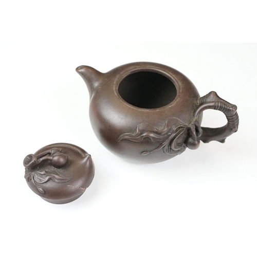 47 - Chinese terracotta Yixing tea ware to include a teapot with four small matching tea cups, teapot wit... 