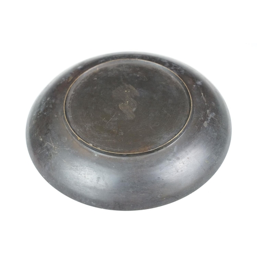 133 - Chinese bronze tazza / footed dish with coin decoration to centre, together with a matching circular... 